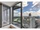 High-rise balcony with incredible city views and glass railings at 3344 Peachtree Ne Rd # 3504, Atlanta, GA 30326