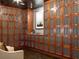 A luxurious wine cellar and room with shelves and a small seating area at 3344 Peachtree Ne Rd # 3504, Atlanta, GA 30326