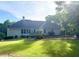 A house with a lovely backyard, a swing set, and many large windows to see the beautiful outdoors at 753 Summer Ridge Dr, Villa Rica, GA 30180