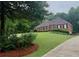 Well-maintained brick home with lush landscaping on a spacious lot at 753 Summer Ridge Dr, Villa Rica, GA 30180