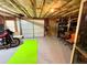 Garage area with storage, work space, multiple doors, and a motorcycle at 753 Summer Ridge Dr, Villa Rica, GA 30180