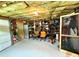 Spacious garage with large shelving, storage, and multiple entrances at 753 Summer Ridge Dr, Villa Rica, GA 30180