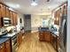 Well-equipped kitchen with stainless steel appliances and wood cabinetry at 753 Summer Ridge Dr, Villa Rica, GA 30180