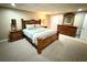 Main bedroom features carpet, matching dressers, night stands and a king size bed at 753 Summer Ridge Dr, Villa Rica, GA 30180