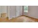 Bedroom with hardwood flooring, and neutral-colored walls with windows for plenty of light at 1131 Forrest Blvd, Decatur, GA 30030