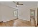 Comfortable bedroom with hardwood floors, neutral walls, and a ceiling fan for added comfort at 1131 Forrest Blvd, Decatur, GA 30030