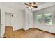 This bedroom boasts natural light, hardwood floors, and neutral paint at 1131 Forrest Blvd, Decatur, GA 30030