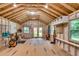The shed's interior is spacious, with plywood flooring, bright lighting, and open stud walls at 1131 Forrest Blvd, Decatur, GA 30030