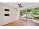 Sunroom filled with natural light from large windows and a ceiling fan above at 1131 Forrest Blvd, Decatur, GA 30030