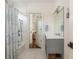 Bathroom featuring a shower with designer curtains and a vanity with a grey base at 174 Pearl Se St, Atlanta, GA 30316