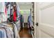 Walk-in closet offering ample storage with custom shelving, drawers, and hanging rods at 174 Pearl Se St, Atlanta, GA 30316