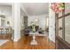 Elegant foyer with hardwood floors, an open floor plan, and views of the living spaces at 174 Pearl Se St, Atlanta, GA 30316