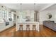 Bright open kitchen features a center island, stainless steel appliances, and hardwood floors at 174 Pearl Se St, Atlanta, GA 30316