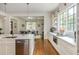 Spacious open-concept kitchen and dining area with hardwood floors and natural light at 174 Pearl Se St, Atlanta, GA 30316