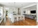 Open concept living space with kitchen island and comfortable seating area at 174 Pearl Se St, Atlanta, GA 30316