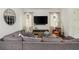 Comfortable gray sectional sofa situated in a living room with natural light and stylish decor at 174 Pearl Se St, Atlanta, GA 30316