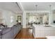 Bright open-concept features a modern kitchen, dining space, and living room with natural light at 174 Pearl Se St, Atlanta, GA 30316