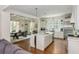 Bright open-concept features a modern kitchen, dining space, and living room at 174 Pearl Se St, Atlanta, GA 30316