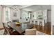 Open concept layout showcasing a kitchen island, dining area and hardwood flooring at 174 Pearl Se St, Atlanta, GA 30316