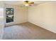 Bedroom featuring neutral carpet and a large window at 3301 Henderson Mill Rd # 1, Atlanta, GA 30341