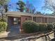 Charming brick home with covered walkway, lovely landscaping and mature trees in a well maintained community at 3301 Henderson Mill Rd # 1, Atlanta, GA 30341