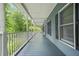 Expansive front porch featuring ample seating and an inviting outdoor living space at 3358 Lake Dr, Lawrenceville, GA 30044