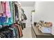 Spacious walk-in closet features built-in shelving and ample storage space for an organized wardrobe at 3358 Lake Dr, Lawrenceville, GA 30044