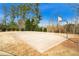 Outdoor basketball court with full court lines and basketball hoop in a community setting at 4020 New Salem Ct, Cumming, GA 30040