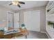 A bright office space featuring a bookcase and a work area with a modern desk at 4020 New Salem Ct, Cumming, GA 30040