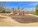 Well-equipped playground with slides, climbing structures, and benches in a community park at 4020 New Salem Ct, Cumming, GA 30040