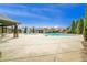 Community pool area with a large swimming pool, shaded seating, and a sunny pool deck at 4020 New Salem Ct, Cumming, GA 30040
