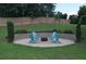 Inviting backyard featuring a fire pit area with Adirondack chairs, perfect for outdoor gatherings and relaxation at 1504 Terminal Ct, Mcdonough, GA 30252