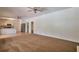 Open-concept living area connecting the kitchen with an eat-in island at 1504 Terminal Ct, Mcdonough, GA 30252