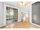 Light-filled living space featuring sliding glass doors to outside deck at 305 Mill Pond Se Ct, Smyrna, GA 30082