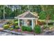 Mail kiosk featuring a mailbox, multiple mail slots, and surrounding landscaping at 305 Mill Pond Se Ct, Smyrna, GA 30082