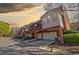 Inviting townhome featuring a private garage and charming, screened-in balcony at 5210 Davenport Pl, Roswell, GA 30075
