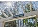 Walking trail entrance, a welcoming gateway to nature with lush greenery and scenic surroundings at 5210 Davenport Pl, Roswell, GA 30075