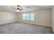 This spacious bonus room is filled with natural light at 6515 Bentley Ridge Dr, Cumming, GA 30040