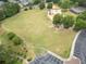 Expansive green park featuring a playground, walking path, picnic shelter and ample space for recreation at 200 Glen Wood Place, Canton, GA 30114