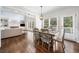 Dining room with hardwood floors, natural light, and adjoins the living area at 200 Glen Wood Place, Canton, GA 30114