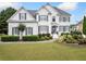 Charming two-story home with landscaped yard and inviting curb appeal in a residential neighborhood at 200 Glen Wood Place, Canton, GA 30114