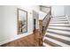 Foyer view with hardwood flooring and staircase that leads to the second floor of the home at 200 Glen Wood Place, Canton, GA 30114