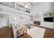 Living room with high ceilings, stone fireplace and built-ins, and cozy furniture and decor at 200 Glen Wood Place, Canton, GA 30114