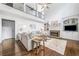 Bright living room with high ceilings, fireplace, built-in shelving, and hardwood floors at 200 Glen Wood Place, Canton, GA 30114
