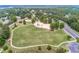 A vibrant community playground sitting on a large grassy field, and close to a parking lot for easy access at 200 Glen Wood Place, Canton, GA 30114