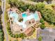Overhead view of community pool area with lazy river, slide and ample lounge seating at 200 Glen Wood Place, Canton, GA 30114
