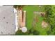 Aerial view of a backyard featuring a deck, fire pit, and a landscaped yard at 2653 W Main Nw St, Atlanta, GA 30318