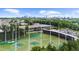 Aerial view of Topgolf facility with driving range and parking lot and Atlanta skyline in the background at 2653 W Main Nw St, Atlanta, GA 30318