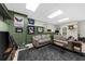 Comfortable basement with ample seating, stylish decor, and a cozy atmosphere for relaxing and entertaining guests at 2653 W Main Nw St, Atlanta, GA 30318