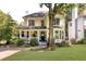 Charming two-story home with a welcoming front porch and a well-maintained lawn at 2653 W Main Nw St, Atlanta, GA 30318